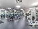 Fully equipped gym with mirrored walls and a variety of weight training and cardio machines at 880 Mandalay Ave # C512, Clearwater Beach, FL 33767