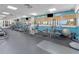 Spacious gym with modern equipment, rubber flooring, and scenic outdoor views at 880 Mandalay Ave # C512, Clearwater Beach, FL 33767