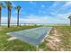 Outdoor shuffleboard court near the beach, perfect for recreational activities with Gathering and friends at 880 Mandalay Ave # C512, Clearwater Beach, FL 33767
