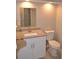 Bright bathroom features a single vanity and toilet at 11227 Thicket Ct, Tampa, FL 33624