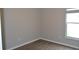 Cozy bedroom features durable floors, a window for natural light and fresh paint at 11227 Thicket Ct, Tampa, FL 33624