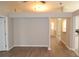 Inviting living area with wood floors that seamlessly flows into the kitchen and other spaces at 11227 Thicket Ct, Tampa, FL 33624