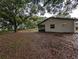 Scenic backyard with a screened-in patio area, perfect for enjoying the outdoors at 11308 Echo View Dr, Odessa, FL 33556