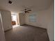 Spacious bedroom featuring an ensuite bathroom and updated window at 11308 Echo View Dr, Odessa, FL 33556