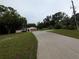 A well maintained home with a long driveway on a spacious lot at 11308 Echo View Dr, Odessa, FL 33556