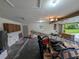 Spacious garage features lots of lighting and plentiful storage space at 11308 Echo View Dr, Odessa, FL 33556
