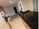 Kitchen showcasing oak cabinets, granite countertops, stainless steel appliances and tile floors at 11308 Echo View Dr, Odessa, FL 33556