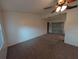 Bright living room featuring carpeting, a ceiling fan, and access to the screened in lanai at 11308 Echo View Dr, Odessa, FL 33556