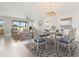 Bright dining area with coordinated decor adjacent to a spacious living area at 11745 Brighton Knoll Loop, Riverview, FL 33579