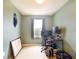 Bedroom with a work-from-home setup, providing a functional and comfortable space at 11926 Grand Kempston Dr, Gibsonton, FL 33534