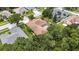 Scenic aerial view of the neighborhood showcasing the home's location among lush greenery at 1216 Fox Chapel Dr, Lutz, FL 33549