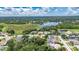 Aerial view of the neighborhood, close to the lake, showcasing the home's prime location at 1216 Fox Chapel Dr, Lutz, FL 33549