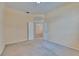 Spacious bedroom with double doors leading to another room, offering flexibility and convenience at 1216 Fox Chapel Dr, Lutz, FL 33549