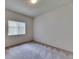 Cozy bedroom featuring neutral carpet, bright window, and ample natural light at 1216 Fox Chapel Dr, Lutz, FL 33549