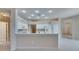 Open-concept kitchen with a breakfast bar at 1216 Fox Chapel Dr, Lutz, FL 33549