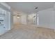 Bright living room showcases open design with views to the kitchen, dining area, and the entryway at 1216 Fox Chapel Dr, Lutz, FL 33549