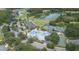 Community aerial view showcasing the pool, tennis courts, and lush landscaping at 18136 Nassau Point Dr, Tampa, FL 33647