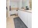 Spacious bathroom with a dual sink vanity, soaking tub, and separate shower at 18136 Nassau Point Dr, Tampa, FL 33647