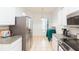 Bright kitchen and dining area feature modern appliances, granite countertops, and tile flooring at 18136 Nassau Point Dr, Tampa, FL 33647