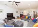 Spacious living room featuring hardwood floors and modern decor at 18136 Nassau Point Dr, Tampa, FL 33647