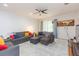 Bright living room featuring plush gray couches, and stylish decor accents at 18136 Nassau Point Dr, Tampa, FL 33647