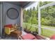 Relaxing screened-in patio with comfortable seating and scenic backyard views at 18136 Nassau Point Dr, Tampa, FL 33647