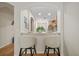 Stylish kitchen bar with seating, open to the main living area, perfect for casual dining and entertaining at 2349 Willimette Dr, Wesley Chapel, FL 33543
