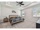 Bright bedroom with a ceiling fan, recessed lighting, and large windows at 2518 Chapel Oak Bnd, Wesley Chapel, FL 33543