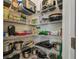 Well-organized pantry with ample shelving for food storage at 2518 Chapel Oak Bnd, Wesley Chapel, FL 33543