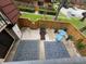 Cozy back patio with a small fence, stylish outdoor rugs, and comfortable seating at 2716 11Th Ct, Palm Harbor, FL 34684