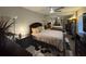 Comfortable bedroom with carpeted floors, mirrored closet doors and stylish furniture at 2716 11Th Ct, Palm Harbor, FL 34684