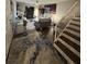 View of living room from stairs, showing decor and stairs at 2716 11Th Ct, Palm Harbor, FL 34684