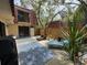 Inviting patio with comfortable seating and lush landscaping for outdoor relaxation and entertaining at 2716 11Th Ct, Palm Harbor, FL 34684