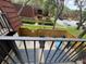 Private patio featuring a lounge chair, outdoor rug and fenced yard perfect for relaxing outdoors at 2716 11Th Ct, Palm Harbor, FL 34684