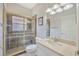 Cozy bathroom with shower, toilet, vanity, and modern accents that add appeal at 31241 Kirkshire Ct, Wesley Chapel, FL 33543