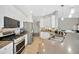 Modern kitchen features stainless steel appliances and ample countertop space at 31241 Kirkshire Ct, Wesley Chapel, FL 33543