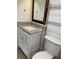 Granite countertop vanity and modern fixtures add style to this bathroom at 320 N Bayshore Blvd # 203, Clearwater, FL 33759