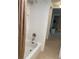 Bathroom featuring a shower with white tile and a modern shower head at 320 N Bayshore Blvd # 203, Clearwater, FL 33759