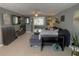 Comfortable living room with neutral walls, tile floor, and an abundance of decor at 3811 Elmwood Dr, Holiday, FL 34691
