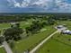 Picturesque land featuring mature trees and serene pond, perfect for estate or development at 4205 Old Mulberry Rd, Plant City, FL 33567