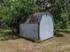 Simple outbuilding with classic design, offering functional space for storage or hobbies at 4205 Old Mulberry Rd, Plant City, FL 33567