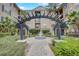 Beautiful courtyard with lush greenery, a fountain, and decorative archways, perfect for relaxation at 4221 W Spruce St # 2328, Tampa, FL 33607