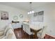 Elegant dining room featuring stylish furniture and hardwood flooring at 4221 W Spruce St # 2328, Tampa, FL 33607