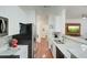 Kitchen with granite countertops, stainless steel appliances, and hardwood floors at 4221 W Spruce St # 2328, Tampa, FL 33607