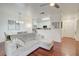 Spacious living room showcasing hardwood floors and open access to kitchen at 4221 W Spruce St # 2328, Tampa, FL 33607