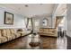 A comfortable lounge area features couches, modern decor, and neutral paint and flooring at 4221 W Spruce St # 2328, Tampa, FL 33607