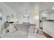 Bright and airy living room with modern sofa and view into the kitchen area at 4221 W Spruce St # 2328, Tampa, FL 33607