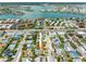 A beautiful coastal home featuring a vibrant orange roof, a pool, and a location near the beach and waterfront at 429 87Th Ave, St Pete Beach, FL 33706