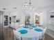 Charming dining area with stainless steel appliances and easy access to the living room, great for gatherings at 429 87Th Ave, St Pete Beach, FL 33706