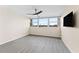 Bright room with updated flooring and a ceiling fan provides the canvas for your desired design at 450 Treasure Isle Causeway # 212, Treasure Island, FL 33706